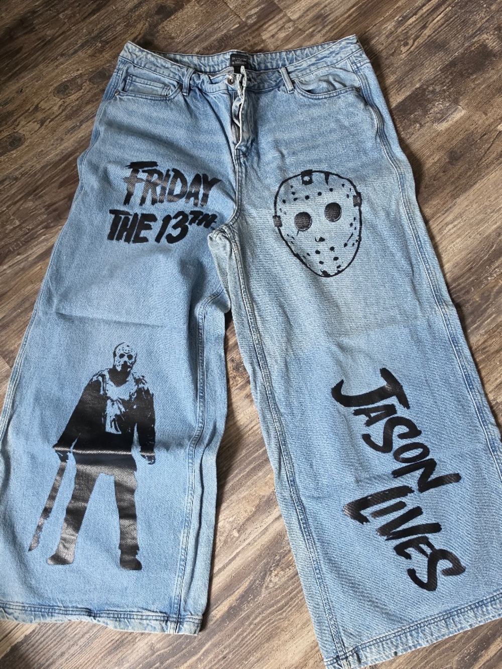 Hot Topic Light Blue Jeans with Black Horror Graphics